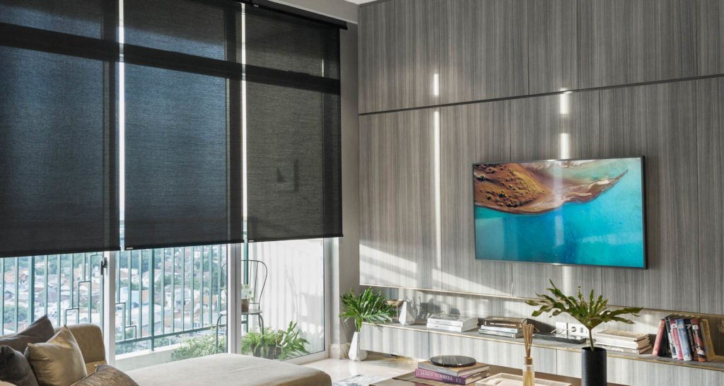 In this modern living room, motorized Coulisse Roller Blinds by Nice Group contribute to a highly automated and inviting space. Image: Nice Group USA.