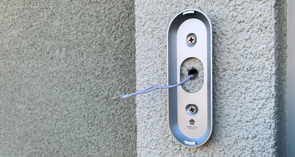 Step 4: Once the power adapter cable is pulled through the wall, connect the wires to the terminals on the Nest Hello. Image: Digitized House.